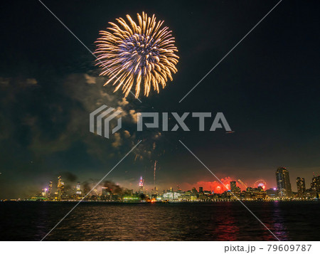 Fireworks celebration of July 4th with the famous Manhattan skyline 79609787