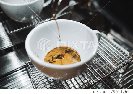Espresso Coffee machine making a coffee Espresso Coffee machine making a coffee 79611260
