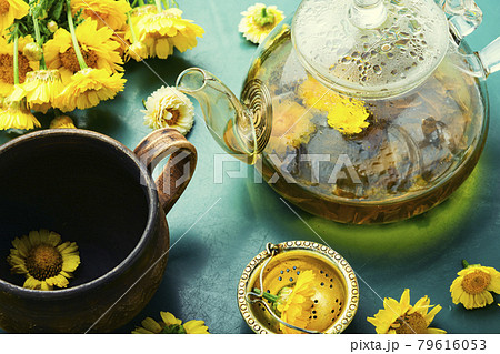 Glass teapot with flower tea,herbalism 79616053