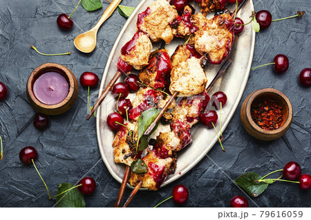 Chicken skewers in cherry marinade 79616059