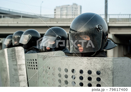 Group of police forces in uniform Group of police forces in uniform 79617400