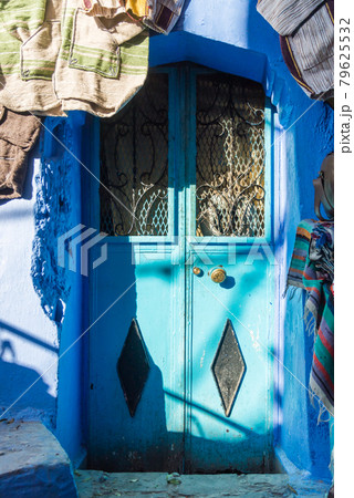 A gate on the street of Chefchaouen,Morocco. Old traditional town. A gate on the street of Chefchaouen,Morocco. Old traditional town. 79625532