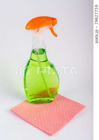 Spray Bottle and cleaning cloth on white background. Spray Bottle and cleaning cloth on white background. 79627759