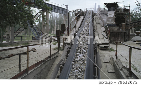 Conveyor belt with gravel on mining site Conveyor belt with gravel on mining site 79632075