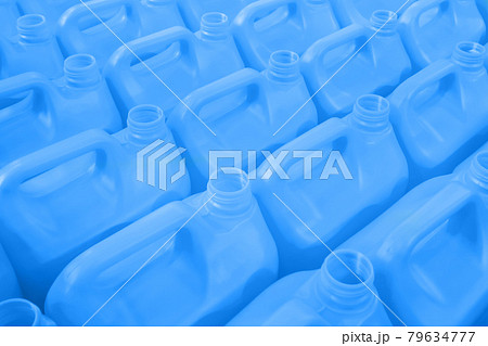 Many empty blue plastic jerrycans background Many empty blue plastic jerrycans background 79634777