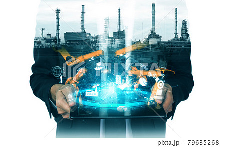 Mechanized industry robot arm and factory worker double exposure 79635268