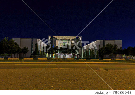 View on illuminated chancellery in Berlin at night from ground perspective 79636043