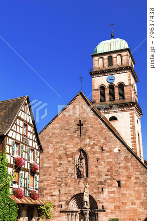 Colorful floral decorated houses of Alsace villages in France Colorful floral decorated houses of Alsace villages in France 79637438