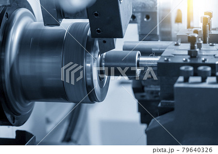 The  CNC lathe machine cutting the metal shaft parts. 79640326