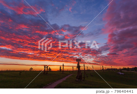 Cross and Angel sculptures on a hill of Angels in Lithuania 79640441