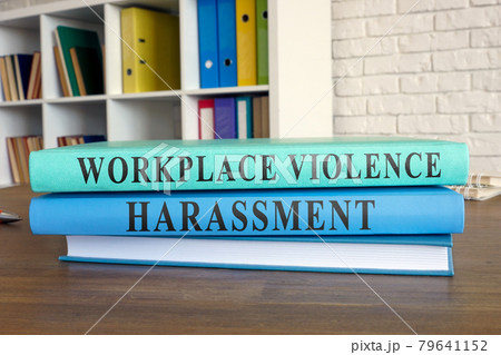 Law book about workplace violence and harassment. 79641152