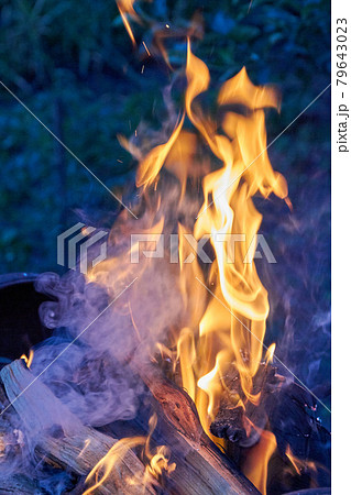 Vertical shot burning bonfire flame in the dead of night. Vertical shot burning bonfire flame in the dead of night. 79643023