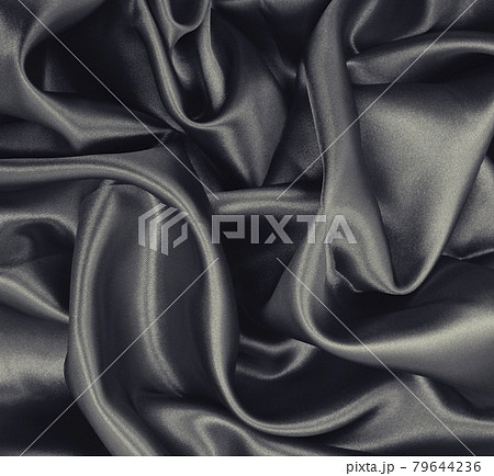 Smooth elegant brown silk or satin texture as abstract background. Luxurious background design. Sepia toned. Retro style Smooth elegant brown silk or satin texture as abstract background. Luxurious background design. Sepia toned. Retro style 79644236