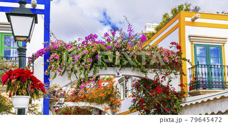 Charming floral decorated streets of Puerto de Mogan in Gran Canaria island Charming floral decorated streets of Puerto de Mogan in Gran Canaria island 79645472