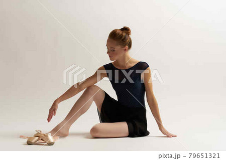 woman ballerina in black costume performing dance silhouette woman ballerina in black costume performing dance silhouette 79651321