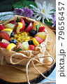 Close up Summer Fruits and Passion Fruit Sauce Topping on Cheesecake 79656457