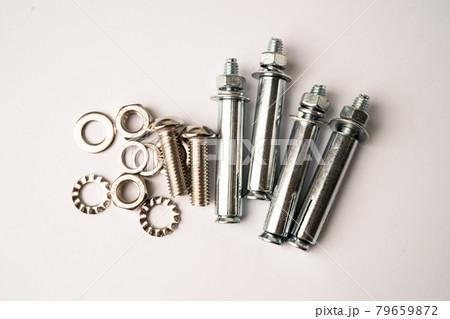 Metal drill screw on white background, construction industrial concept. 79659872