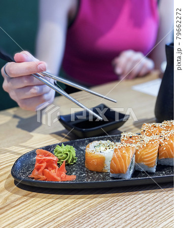Eating roll sushi Eating roll sushi 79662272