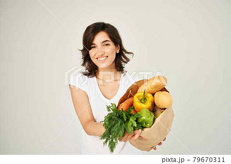 woman with food package healthy food delivery service 79670311