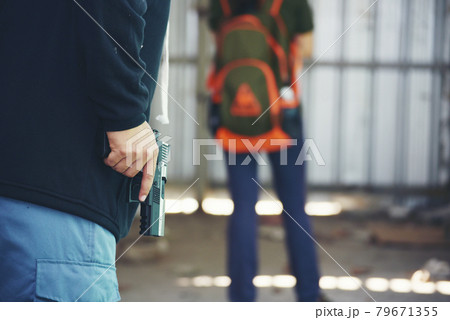 Thief armed man rob woman by gun on street so scared shocked face. Frightened asian woman was rob aggressive by danger bandit man. Robbery thief using gun burglar. Criminal aggression crime concept. Thief armed man rob woman by gun on street so scared shocked face. Frightened asian woman was rob aggressive by danger bandit man. Robbery thief using gun burglar. Criminal aggression crime concept. 79671355