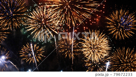 Golden Firework celebrate anniversary happy new year 2022, 4th of july holiday festival. Gold firework in the night time celebrate national holiday. Countdown to new year 2022 gold party time event 79672233