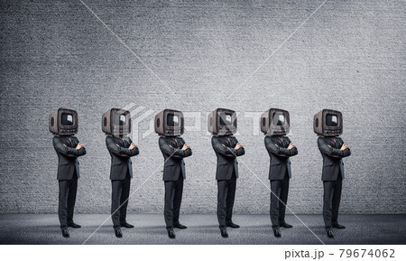 Businessmen with old TV instead of head. 79674062
