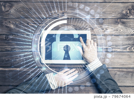 Concept of computer access with media lock icon on tablet screen 79674064