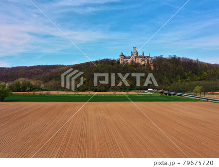 Aerial view over fields, meadows and the river Leine to Marienburg Castle near Hannover Aerial view over fields, meadows and the river Leine to Marienburg Castle near Hannover 79675720