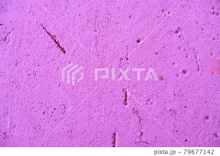 Flat concrete surface covered with a thin layer of paint with scratches and potholes, changed color, bright background 79677142