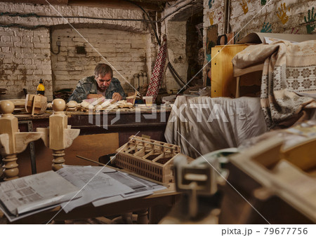 Portrait of carpenter, craftsman in carpentry workshop. Artist at work, hobby like profession Portrait of carpenter, craftsman in carpentry workshop. Artist at work, hobby like profession 79677756