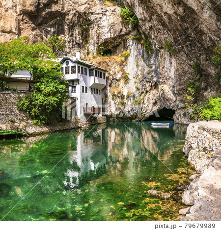 Blagaj Tekija: Beautiful Monastery Under A Cliff. Landmarks of Bosnia and Herzegovina Blagaj Tekija: Beautiful Monastery Under A Cliff. Landmarks of Bosnia and Herzegovina 79679989