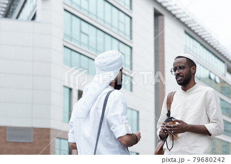 Men in Islamic Clothes Talking Outdoors Men in Islamic Clothes Talking Outdoors 79680242