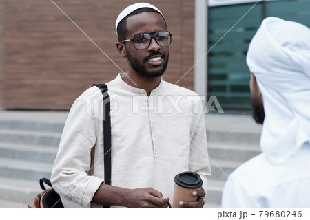Black Man Talking To Colleague Black Man Talking To Colleague 79680246