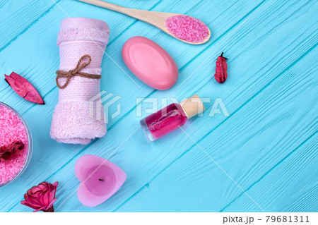 Flat lay top view bathroom stuff on blue wooden desk. Flat lay top view bathroom stuff on blue wooden desk. 79681311