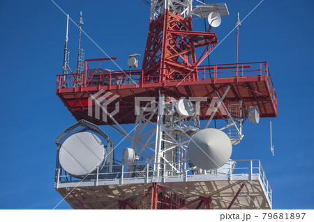 Detail of a telecommunication tower with directional mobile phone and internet antennas. Wireless communication equipment transmitter. 5G Technology. Detail of a telecommunication tower with directional mobile phone and internet antennas. Wireless communication equipment transmitter. 5G Technology. 79681897