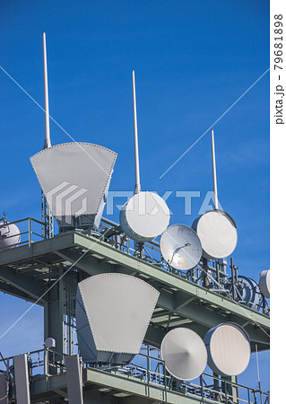 Detail of a telecommunication tower with directional mobile phone and internet antennas. Wireless communication equipment transmitter. 5G Technology. Detail of a telecommunication tower with directional mobile phone and internet antennas. Wireless communication equipment transmitter. 5G Technology. 79681898