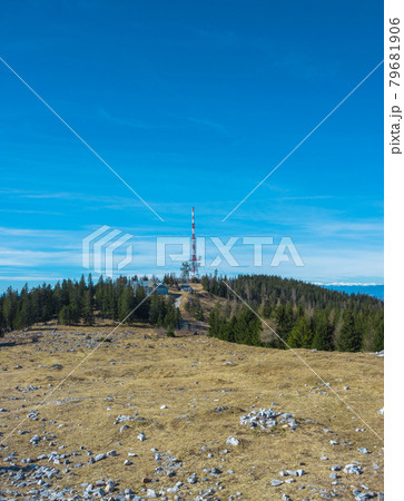 Telecommunication tower with directional mobile phone and internet antennas on Schockl Mountain in St. Radegund, near Graz, Austria. Wireless communication equipment transmitter. 5G Technology. 79681906