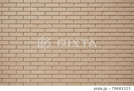 細長い土色レンガの背景素材 煉瓦タイルのテクスチャの写真素材