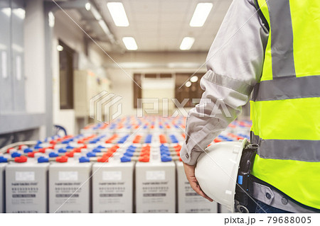 back man engineer in Battery room in power plant for back up emergency case back man engineer in Battery room in power plant for back up emergency case 79688005