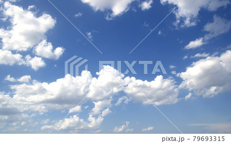 Blue sky background with tiny clouds Blue sky background with tiny clouds 79693315