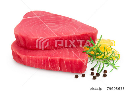 Fresh tuna fish fillet steak with rosemary, lemon and peppercorns isolated on white background with clipping path and full depth of field Fresh tuna fish fillet steak with rosemary, lemon and peppercorns isolated on white background with clipping path and full depth of field 79693633