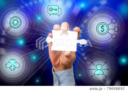 Hand Holding Jigsaw Puzzle Piece Unlocking New Futuristic Technologies. Palm Carrying Puzzles Part Displaying Solving Late Innovative Virtual Ideas. 79698692