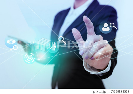 Woman In Uniform Side Standing Carrying Phone Tapping Futuristic Virtual Display Icons. Lady In Suit Holding Mobile Device Touching Innovative And Modern Icon Designs. 79698803
