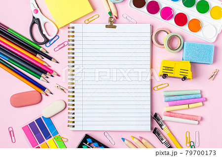 Top view of school supplies on table with copy space 79700173