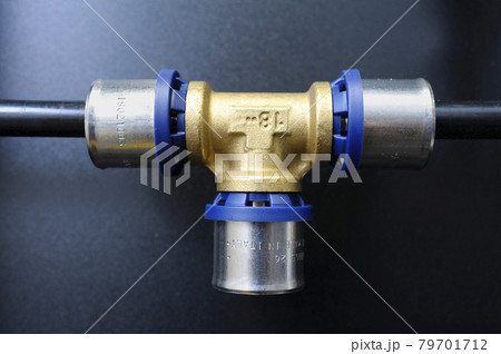 Multipurpose press fitting for multilayer pipes placed on a stand. Plumbing equipment 79701712