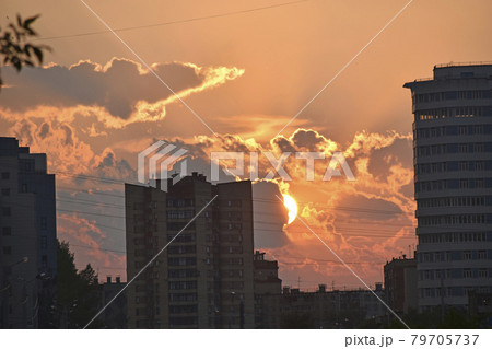 City houses and evening cumulus beautiful clouds City houses and evening cumulus beautiful clouds 79705737