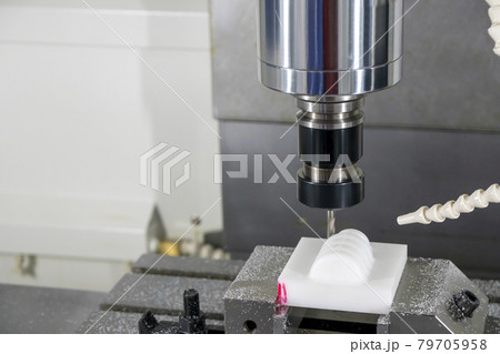 The CNC milling machine cutting the resin parts. The CNC milling machine cutting the resin parts. 79705958
