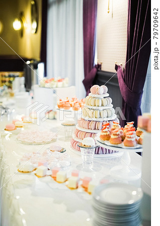 Delicious wedding reception candy bar dessert table 79709642