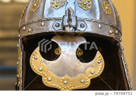 An ancient Knight's helmet with armor.A medieval concept 79709752