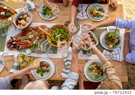 People Toasting with Glasses of Water 79712432